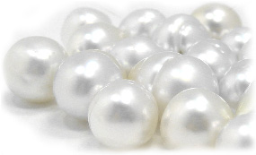 Loose, undrilled white South Sea pearls before they are turned into finished jewelry
